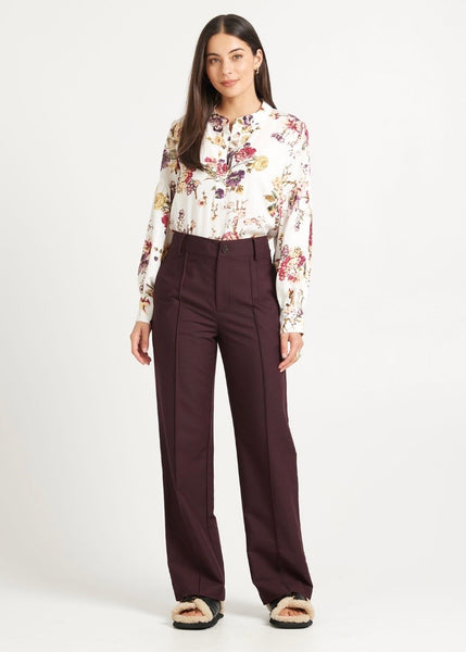 Model wearing Tuesday Base Merlot pant