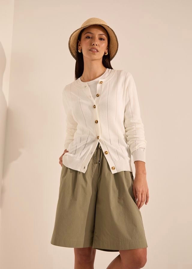 Model wearing Marlow Ember cardigan in chalk colour