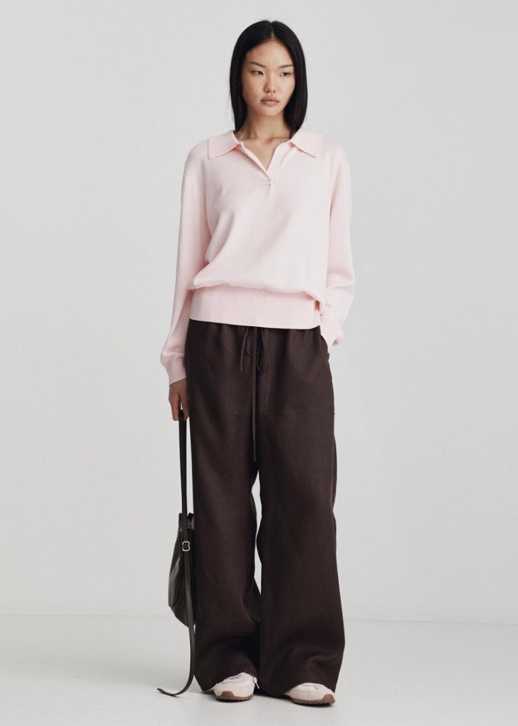 Model wearing Ricochet Marc pant in brown