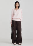 Model wearing Ricochet Marc pant in brown