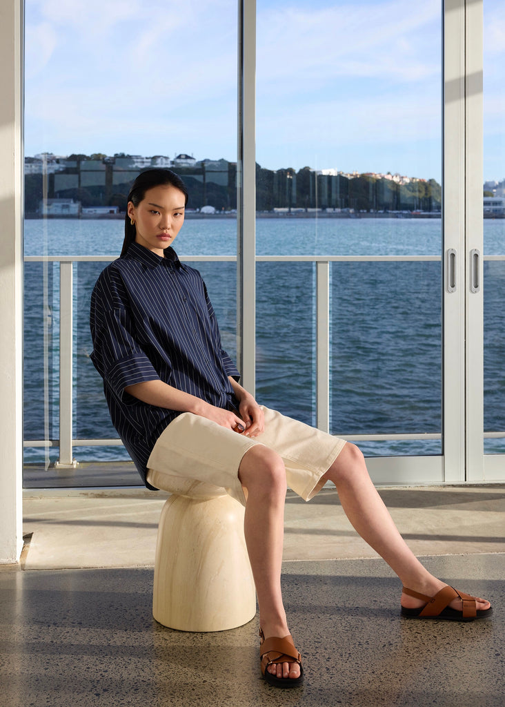 Model wearing Marlow Shoreline shirt in ink stripe