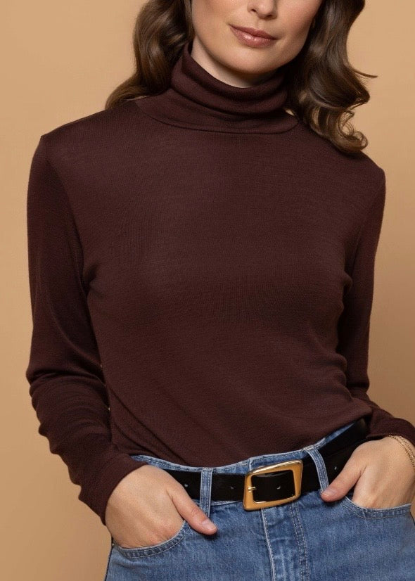 Model wearing Bay Road Polo top in Espresso