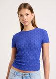 Model wearing Rolla’s Daisy Lace Ultramarine tee