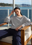 Model wearing Marlow Delta White/Ink Stripe sweater