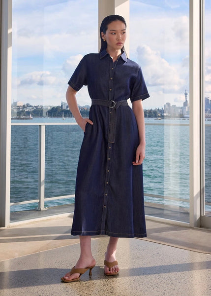 Model wearing Marlow Axis dress in indigo 
