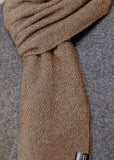 Close up view of Noble Wilde Moss Monti scarf in Latte