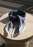 Marlow Prism print ink scarf on a table 