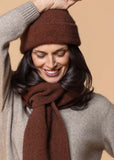 Model wearing Noble Wilde scarf in Rimu