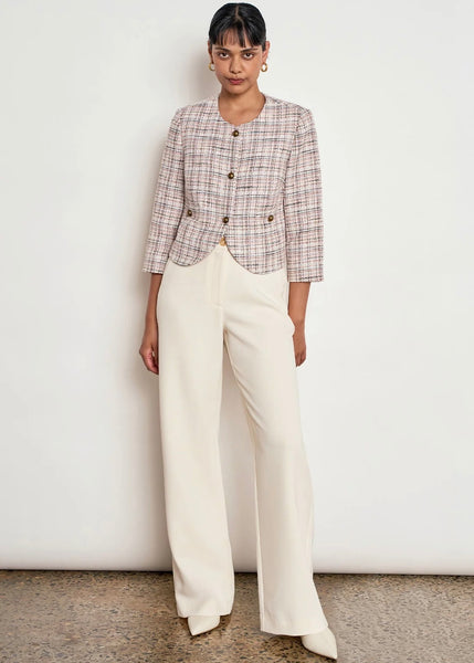 Model wearing Zoe Kratzmann Stride pant in Ecru
