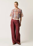 Model wearing Nancybird Bodhi Linen spice pants
