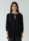 Front view of Sophie Tie top in black check