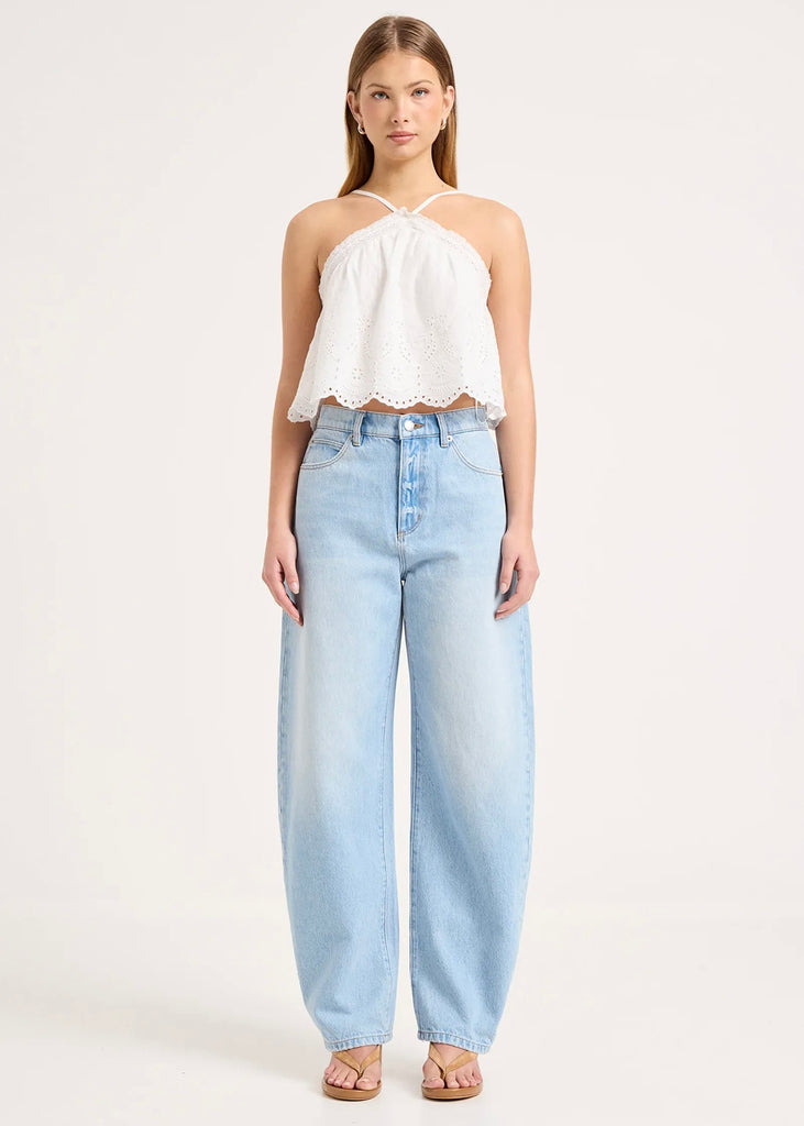 Model wearing Rolla’s Arc Barrel Long Swoon jeans