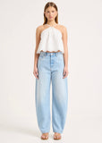 Model wearing Rolla’s Arc Barrel Long Swoon jeans
